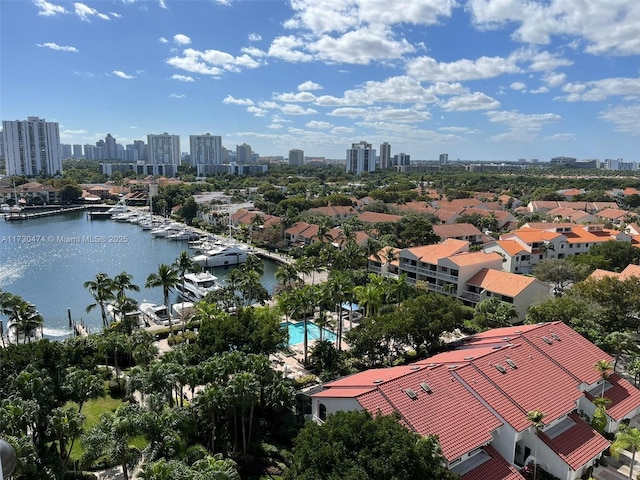 birds eye view of property featuring a water view