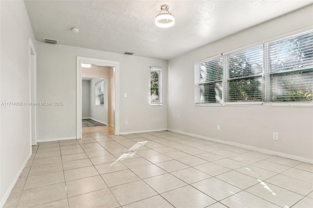 view of tiled empty room