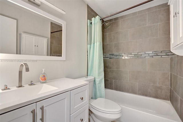 full bathroom with vanity, shower / bath combo, and toilet