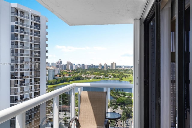 balcony featuring a water view