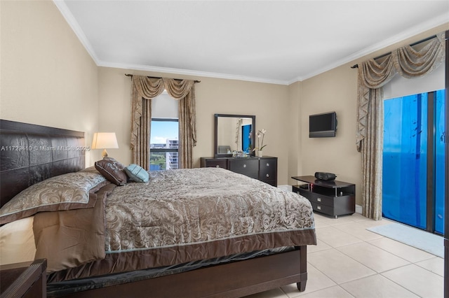 bedroom with crown molding and light tile patterned floors