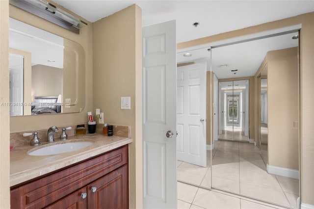 bathroom featuring vanity and tile patterned flooring