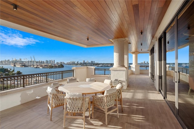 exterior space with a water view and a balcony