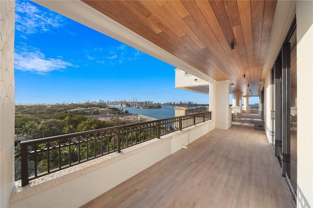 balcony featuring a water view