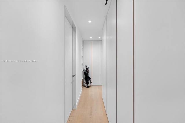 hallway featuring light wood-type flooring