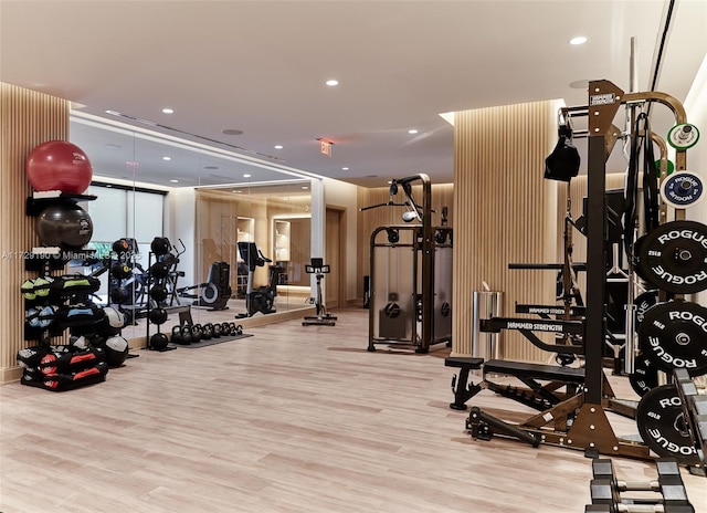 workout area featuring light wood-type flooring