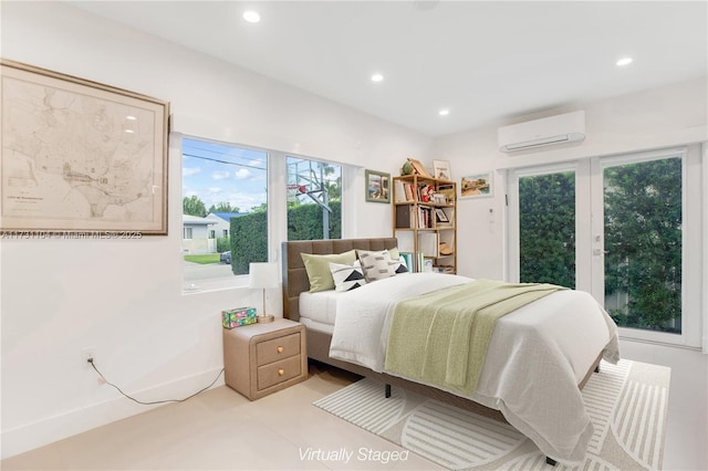 bedroom with an AC wall unit and recessed lighting