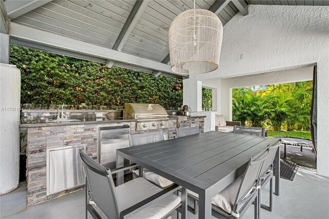 back of property featuring stucco siding, a patio area, and outdoor lounge area