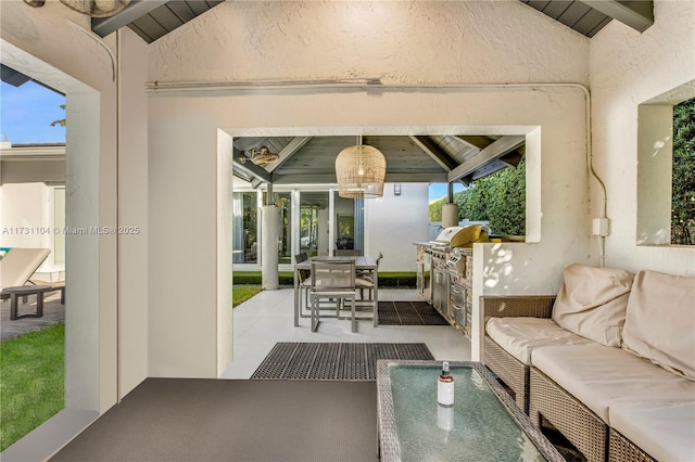 view of patio featuring outdoor dining area, an outdoor living space, and area for grilling