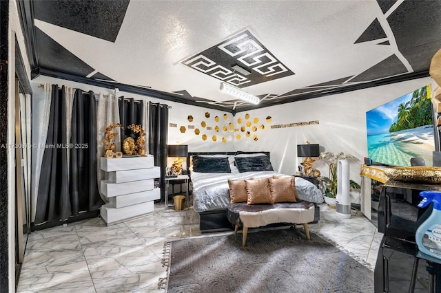 bedroom featuring a textured ceiling