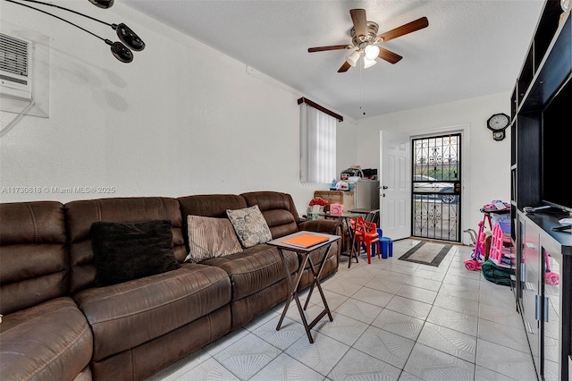 living room featuring ceiling fan and light tile patterned floors