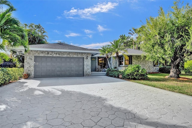 single story home with a garage