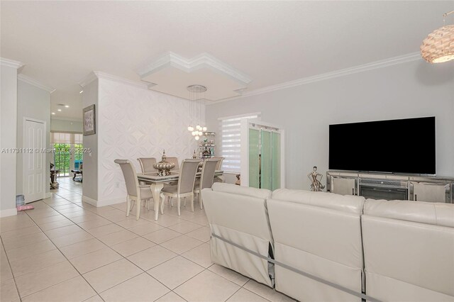 living room featuring ornamental molding, light tile patterned floors, and a fireplace