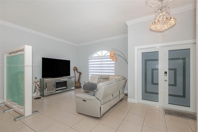 tiled living room with french doors and ornamental molding