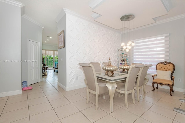 dining area with crown molding and light tile patterned floors