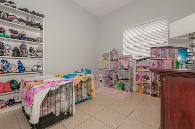 game room with light tile patterned floors