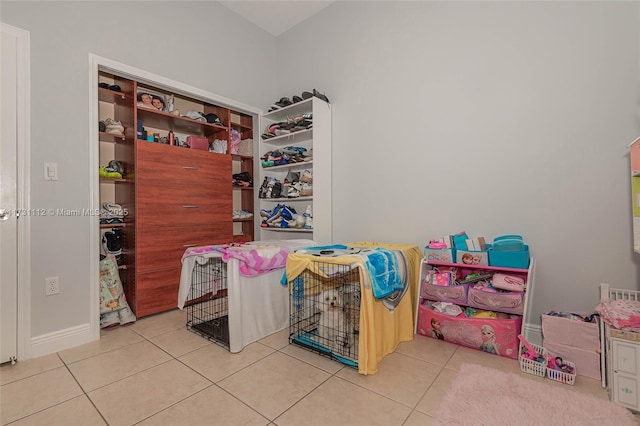 playroom featuring tile patterned floors