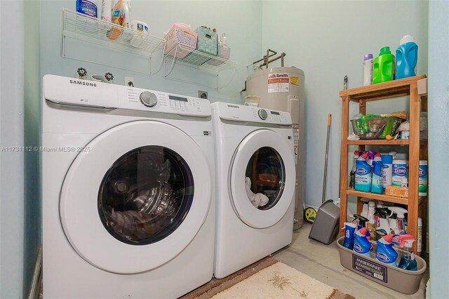 washroom featuring washing machine and clothes dryer