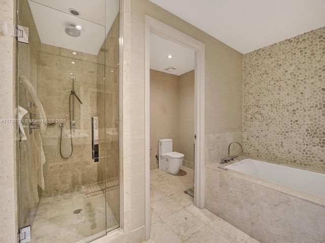 bathroom with plus walk in shower, toilet, and tile patterned flooring