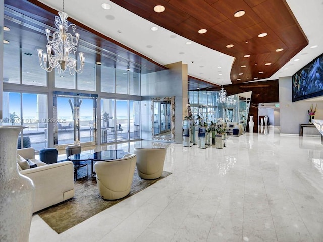 17121 Collins Ave Unit 3905, Sunny Isles Beach, FL 33160 - community lobby featuring a towering ceiling and recessed lighting