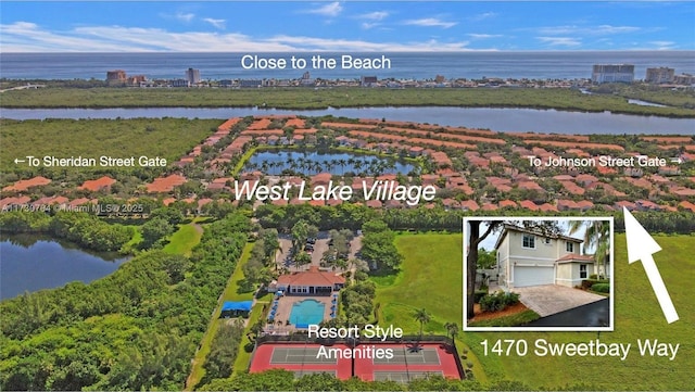 aerial view featuring a water view