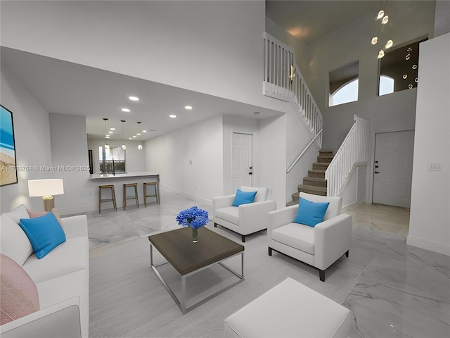 living room featuring recessed lighting, stairway, marble finish floor, and baseboards