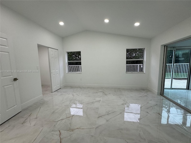 unfurnished room featuring baseboards, recessed lighting, marble finish floor, and vaulted ceiling