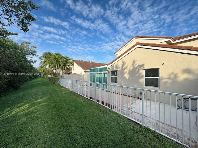 view of yard with fence