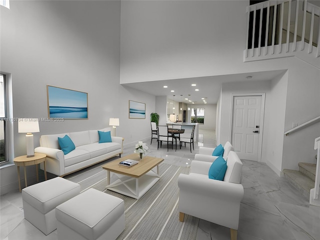 living room featuring stairs, a high ceiling, marble finish floor, and baseboards