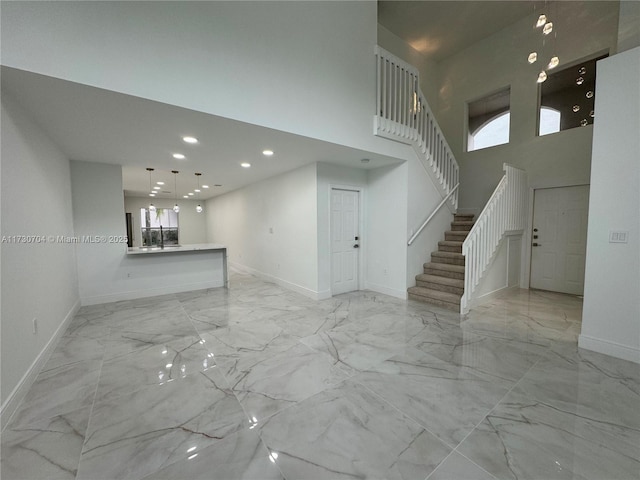 unfurnished living room with a healthy amount of sunlight