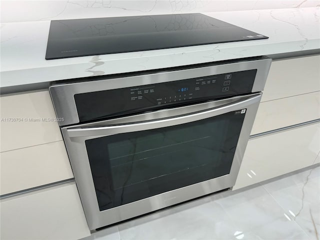 interior details with stainless steel oven