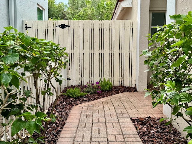 view of patio featuring fence