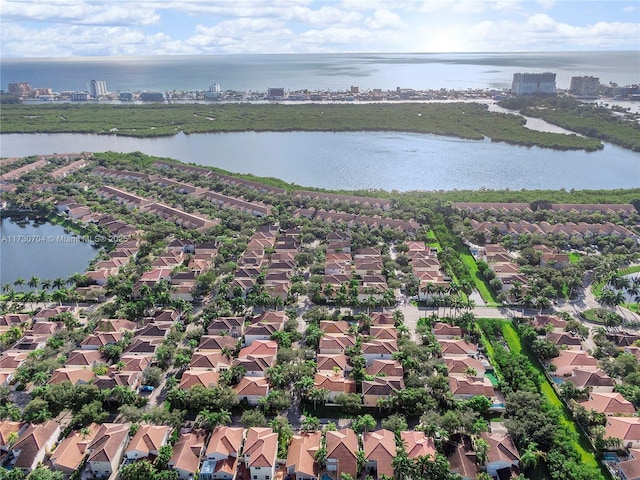 aerial view with a water view and a residential view