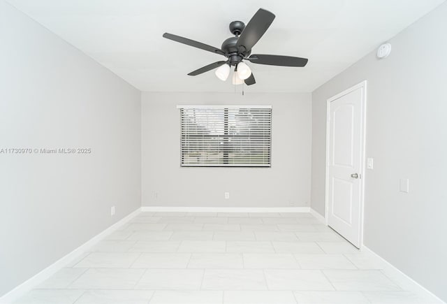 unfurnished room with ceiling fan