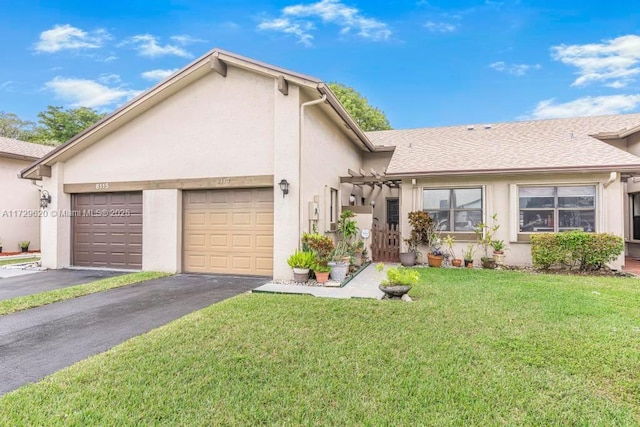 view of front of home featuring a garage, a pergola, and a front lawn