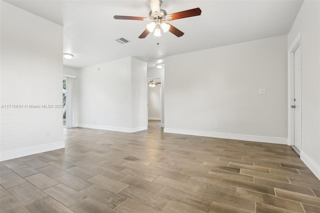 spare room with ceiling fan