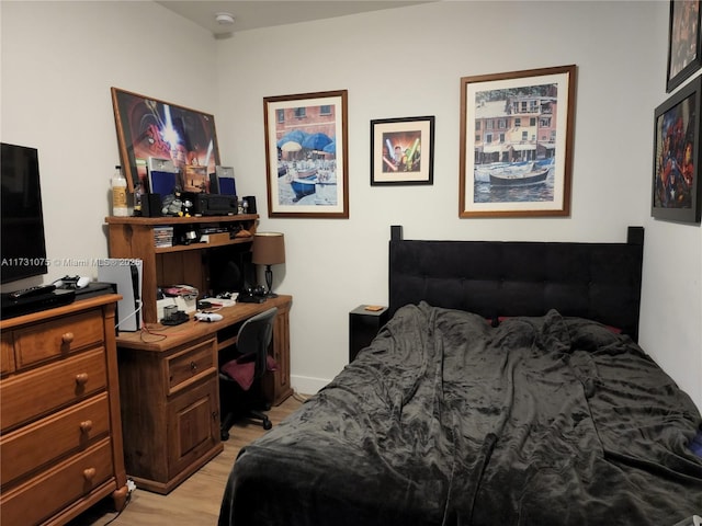 bedroom featuring light wood-type flooring