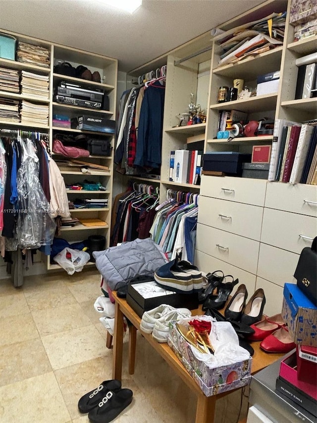 walk in closet featuring tile patterned floors