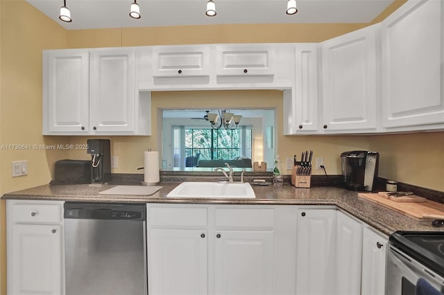 kitchen featuring sink, white cabinets, and stainless steel appliances