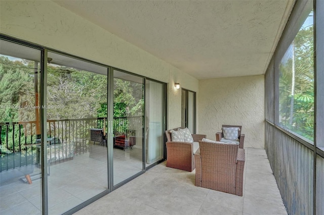 sunroom / solarium featuring a wealth of natural light