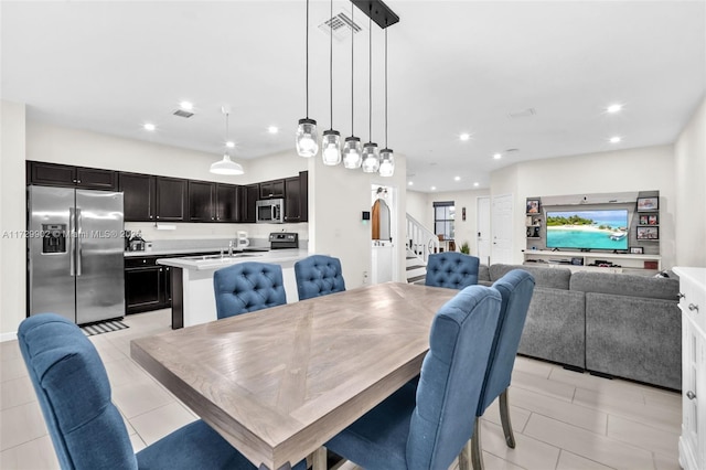 dining room featuring light tile patterned flooring