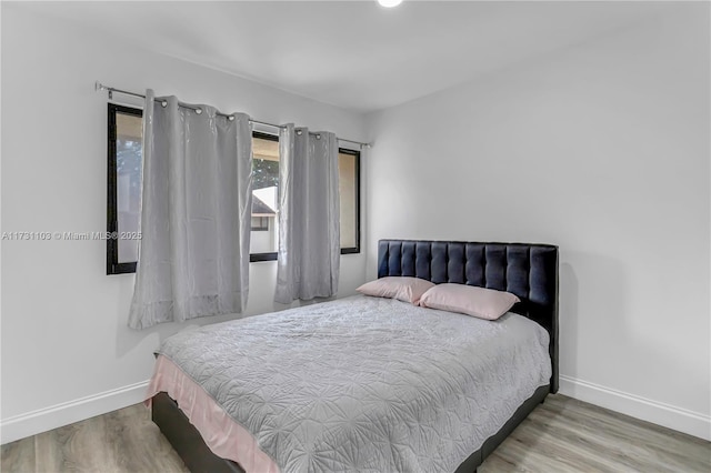 bedroom featuring hardwood / wood-style floors