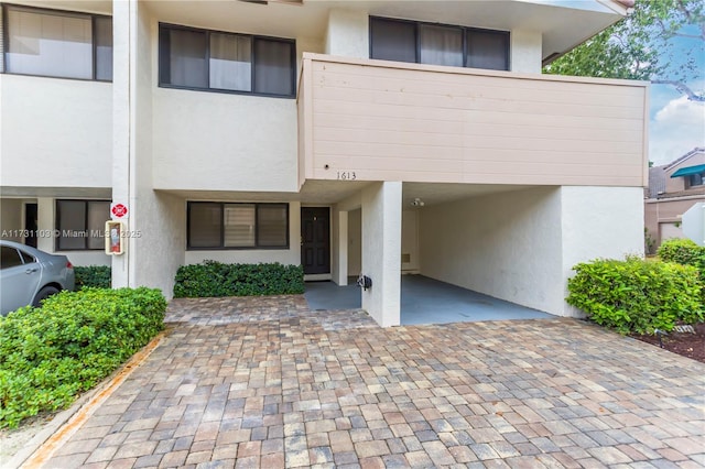 view of front of property with a balcony