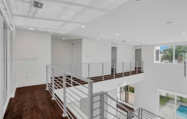 hallway featuring hardwood / wood-style flooring