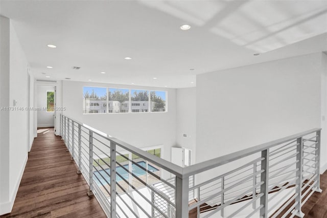 hallway featuring dark hardwood / wood-style floors