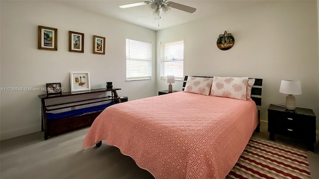 bedroom featuring ceiling fan and carpet floors