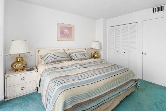 carpeted bedroom with a closet