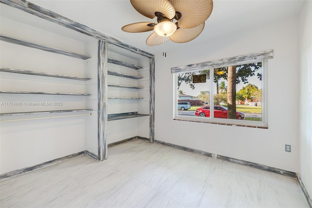 empty room with ceiling fan