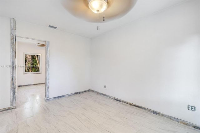 unfurnished room with ceiling fan