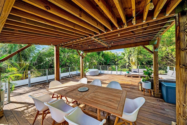 deck with outdoor lounge area and a jacuzzi